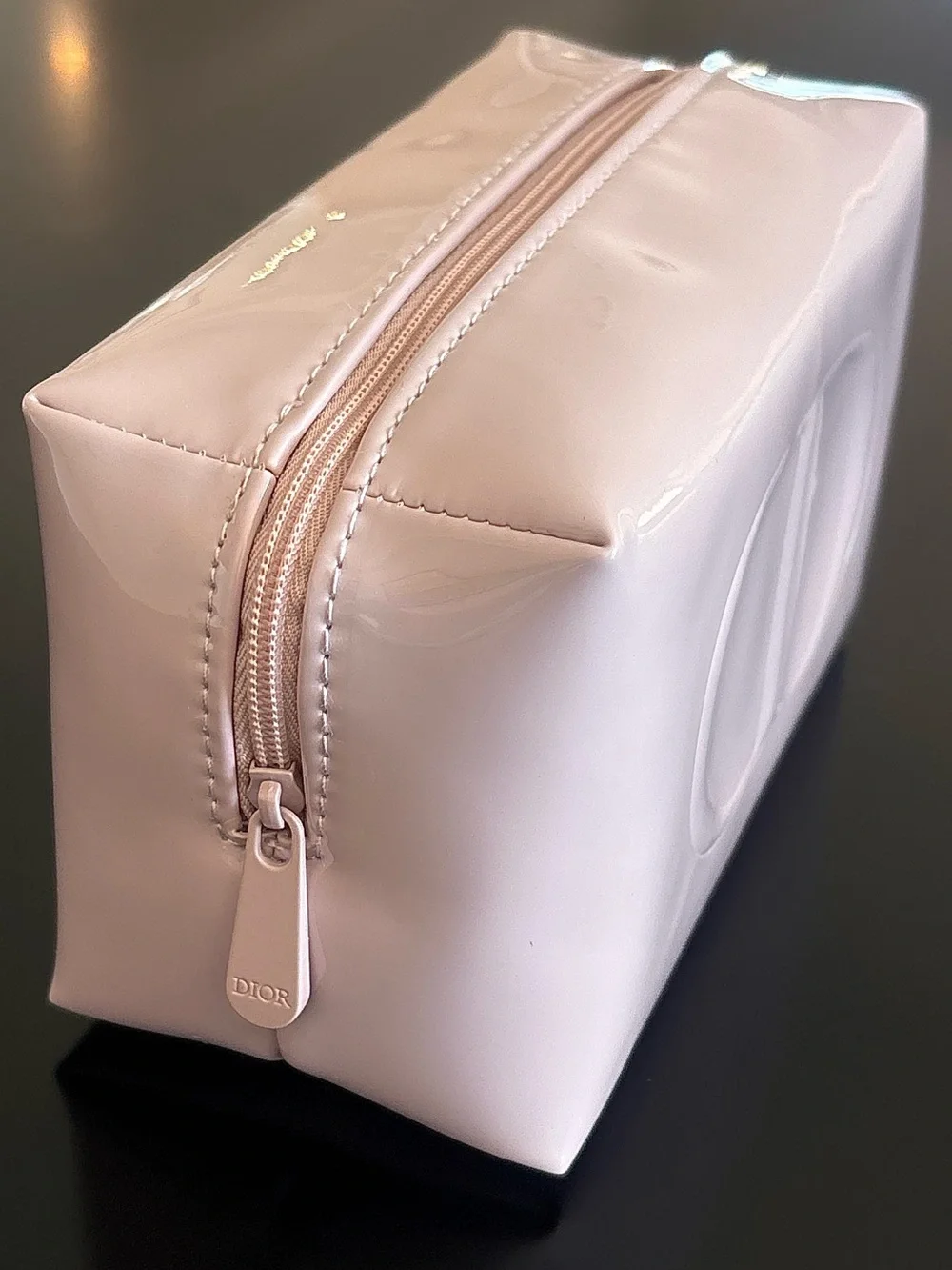 Dior beauty light pink glossy cosmetic bag with embossed CD logo